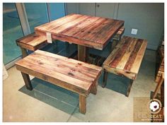 a wooden table and bench sitting next to each other