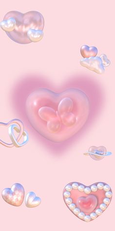 an image of hearts and pearls floating in the air