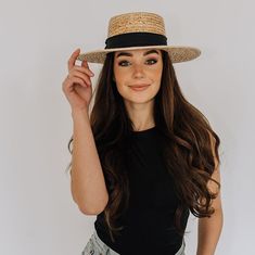 "Introducing the ideal straw boater hat designed for women! Crafted from premium quality straw, this wide-brimmed hat is the epitome of sophistication and elegance. It is expertly woven using traditional techniques from Mexico, resulting in a durable and breathable sun hat that is perfect for summer. The hat features a classic boater crown and a light natural hue that adds to its charming appeal. Moreover, the exclusive black Sandoval strap adds a touch of exclusivity to this beautiful piece. Elevate your summer style with this stunning boater hat and channel your inner ladylike grace. SIZE: MEDIUM Medium (M) = head circumference of 56 - 58.5cm HOW DO I KNOW MY SIZE Discover your size with a measurement tape. Position the tape above your ears and exactly around your head where you want to Chic Boater Hat With Short Brim In Toquilla Straw, Chic Brimmed Boater Hat In Toquilla Straw, Elegant Straw Hat With Flat Crown For Vacation, Toquilla Straw Boater Hat With Short Brim, Fitted Flat Crown Panama Hat For Beach, Casual Fedora With Flat Crown For Spring, Elegant Flat Crown Beach Hat, Straw Fedora With Flat Crown For Vacation, Vacation Straw Fedora With Flat Crown