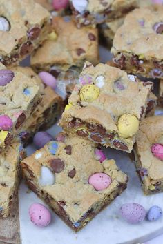 chocolate chip cookie bars with candy eggs on a plate