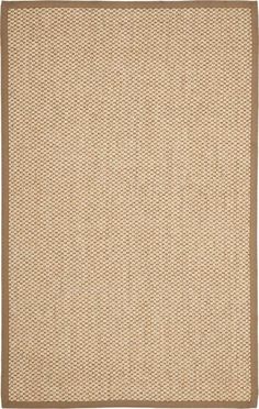 a beige and brown area rug on a white background