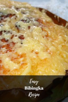 a casserole dish with cheese and other toppings in it on a plate