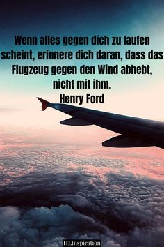 an airplane wing with the words henry ford above it and clouds in the foreground