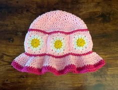 "Samantha \"me\" made crochet pink daisy bucket hat beanie; 90s fashion; daisy sun hat ~~During checkout you will be prompted to select a size the options are; Newborn, 3-6 month, 6-9 month, 12/24, Toddler, Child, Teen/Adult, md adult, large adult. Crochet work stretched quite well. If you have any questions please message me, and i will be glad to help.~~ **Handcrafted from acrylic yarn. There are no hard buttons or eyes on this item. Details are hand sown on with yarn** **Made and shipped from Cute Pink Bucket Hat For Summer, Pink Retro Hat For The Beach, Pink Retro Hat For Beach, Retro Pink Hat For The Beach, Retro Pink Cotton Hat, Retro Pink Hat For Beach, Pink Sun Hat For Spring, One Size Fits Most, Cute Pink Beanie Hat, Retro Pink Brimmed Hat