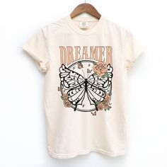 Break the fashion rules in style with our Dreamer Retro Butterfly Short Sleeve T-shirt! This comfy, oversized tee features the perfect blend of boho charm and vintage vibes, for a look that's sure to turn heads. Symbolic of freedom and individuality, you'll love expressing your true self in this one-of-a-kind graphic tee. Dare to fly! Toddler Graphic Tee, Retro Butterfly, Newborn Bodysuit, Love Express, Fashion Rules, Butterfly Theme, Kids Wardrobe, Kids Graphic Tees, Sublimation Prints