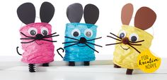 three paper tubes with faces and ears made to look like bugs