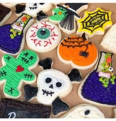 decorated sugar cookies with halloween decorations on them