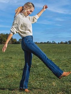 CELEBRATED STYLE STAPLE Few silhouettes are as celebrated as the Wrangler® bootcut. These women’s bootcut jeans feature a hip-hugging high rise that flatters your figure while providing the perfect amount of coverage to keep you comfortable through the day. Their contoured waistband allows the style to sit higher in the back for less gaping while the timeless bootcut jeans offer a versatile look you can dress up or down to suit every occasion. With a leg opening that fits comfortably over combat Bootcut Womens Jeans Wrangler, Styling High Waisted Boot Cut Jeans, Cowgirl Boots With Legging, Elsa Hosk Boots Jeans, Best Jeans For Cowboy Boots Women, Katie Holmes Flare Jeans, Katheryn Winnick Jeans, Boots Jeans Women, Western Boots And Jeans Women