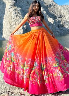 Fun Orange and Pink Poncho and Bustier Lehenga Set Label PS'B - Fabilicious Fashion Mehendi Lehenga Outfits, Orange And Pink Lehenga, Orange Haldi Outfit, Haldi Bridal Outfit, Mehendi Outfits For Bride, Crepe Lehenga, Haldi Outfit For Bride, Bead Mirror, Mehendi Dress