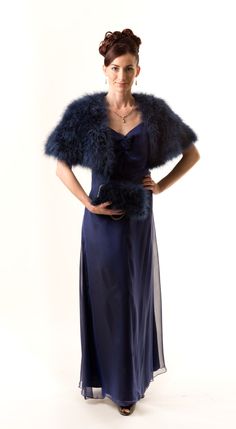 "It can serve both as memorable fashion statement and as functional accessory on your special day. it is an absolute pleasure to put this gorgeous cape over your shoulders, to keep you warm, and accentuate your plunging neckline... On the pictures are shown in a navy blue color FEATHERED COLLECTION \"SHOULDER MIST\" This Collection is made from natural marabou feather, fully lined with 100%silk; Length on the back : 14\"-15\" Think about lovely marabou clutch, which I made as a pair to this shru Chic Fitted Capelet, Elegant Party Capelet, Chic Evening Cape Outerwear, Elegant Party Shrug For Fall, Elegant Blue Outerwear For Wedding, Elegant Fall Party Shrug, Elegant Evening Capelet With Cape Sleeves, Elegant Evening Cape For Winter, Elegant Evening Capelet