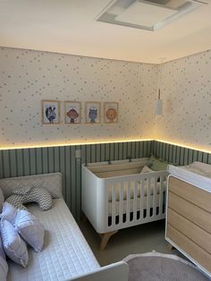 a baby's room with two cribs in it