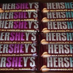 hershey's milk chocolate bars are stacked on top of each other in rows