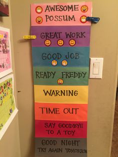 a bulletin board that has been decorated with different colors and sayings on the front