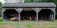 an old wooden shed with many different items in it