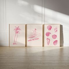 three pink and white paintings on wooden floors