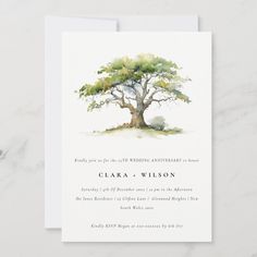 a wedding card with an image of a tree on the front and bottom, in watercolor