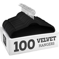 50 velvet hangers in a box with black and white labels on the top one