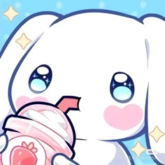 an adorable little white bunny holding a cupcake