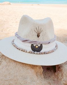 My new hat collection "SUN" design Beige  color Unique and desert design. Suitable for everyday, for a festival, for a vacation and suitable for men and women Hat size: 57 cm Margin width: 6 cm   *Free Shipping Cream Bohemian Panama Hat For The Beach, Bohemian Cream Panama Hat For Beach, Cream Bohemian Panama Hat For Beach, Cream Bohemian Crochet Hat With Adjustable Fit, Bohemian Cream Fedora For Vacation, Cream Bohemian Fedora For Vacation, Cream Bohemian Brimmed Straw Hat, Bohemian Brimmed Cream Sun Hat, Bohemian Cream Wide Brim Sun Hat