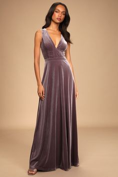 Your enchanted evening begins with the Lulus Beautiful Night Dusty Purple Velvet Sleeveless Maxi Dress! A plunging V-neckline and princess-seamed, sleeveless bodice are formed from luxe stretch velvet fabric. High, banded waist sits above an elegant full maxi skirt. Hidden back zipper/clasp. Fit: This garment fits true to size. Length: Floor length. Size medium measures 63" from shoulder to hem. Bust: Great for any cup size. Waist: Fitted - very fitted at natural waist. Hip: Not Fitted - room fo Fall Bridesmaid Dresses With Shawl, Dark Mauve Velvet Bridesmaid Dress, Dark Purple Dress Wedding Guest, Mauve Purple Dress, Dark Purple Floral Dress, Dusty Pink And Purple Wedding, Dusty Purple Prom Dress, Velvet Dress Purple, Lavender Velvet Dress