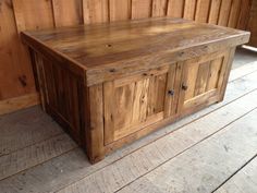 an old wooden chest sitting on top of a wooden floor