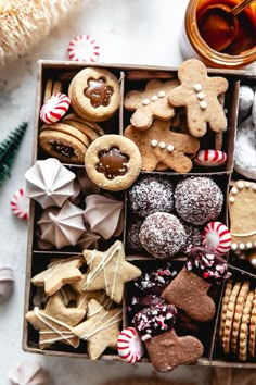 a box filled with lots of different types of cookies