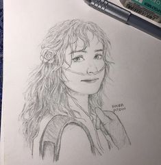 a pencil drawing of a girl with long hair