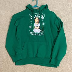 New Without Tags Green Christmas Sweat Shirt With Hood And Front Pocket. Size Medium Will Ferrells Picture On The Sweatshirt It Reads Omg! Santa Buddy The Elf Sweater, Aztec Print Sweater, Black Hoodie Women, Buddy The Elf, Summer Sweaters, Dog Sweatshirt, Cat Sweatshirt, Oh Deer, Green Hoodie