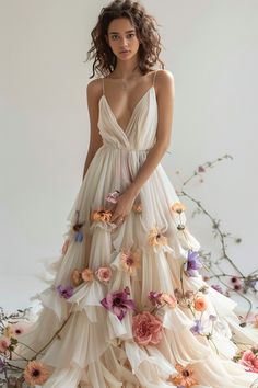 a woman in a dress with flowers on it