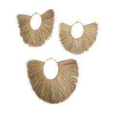 three pairs of earrings with fringes hanging from the hoop on each earring, one in