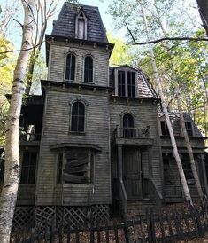 an old wooden house in the woods