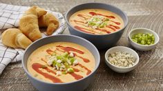 three bowls filled with different types of food