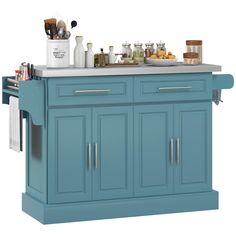 a blue kitchen island with lots of cooking utensils on the top and bottom