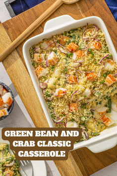 green bean and crab casserole in a white dish on a wooden cutting board