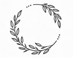 a black and white drawing of a circle with leaves on it's sides, in the center