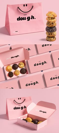 the pink box has cookies in it and is open to reveal its packaging design identity