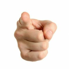 a hand holding something in the air on a white background with focus on the foreground