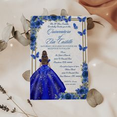 a blue and white wedding card featuring a princess in a dress with butterflies on it