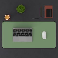 a laptop computer sitting on top of a desk next to a cup of coffee and a mouse