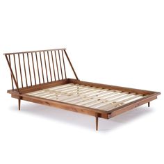 the bed frame is made from wood and has slats on it, with no mattress