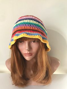 Step into the world of vibrant style with our Crochet Multicolor Unisex Beanie. Crafted for both women and men, this colorful boho hat is a unique handmade gift that's sure to turn heads. Featuring a delightful array of crochet stripes, this beanie adds a pop of color and personality to any outfit. Whether you're hitting the streets or venturing into the great outdoors, its eye-catching design is bound to make a statement. Looking for a gift that's as unique as they are? Look no further! Our Cro Crochet Boho Hat, Trendy Multicolor Hat For Festivals, Trendy Multicolor Festival Hat, Funky Multicolor Bucket Hat For Festivals, Retro Wide Brim Multicolor Hat, Retro Multicolor Wide Brim Hat, Colorful Brimmed Fun Hat, Colorful Fun Brimmed Hat, Funky Multicolor Wide Brim Hat