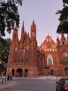 an old church with tall towers and steeples