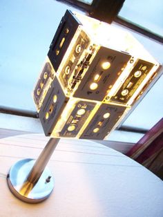 a light that is sitting on top of a table with some kind of object in it