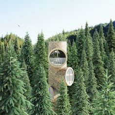 a tree house in the middle of a forest with trees around it and two round windows