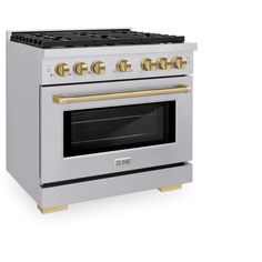 an oven with two burners and gold trimmings on the front, against a white background