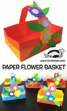 the paper flower basket is on display with four different colors and shapes, including flowers