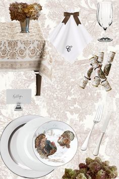 the table is set with white plates and silverware