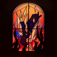 a stained glass window with an image of a man and woman in the middle of it