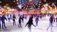 many people are skating on an ice rink at night with ferris wheel in the background