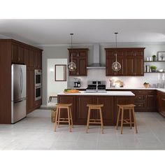 a large kitchen with wooden cabinets and stools